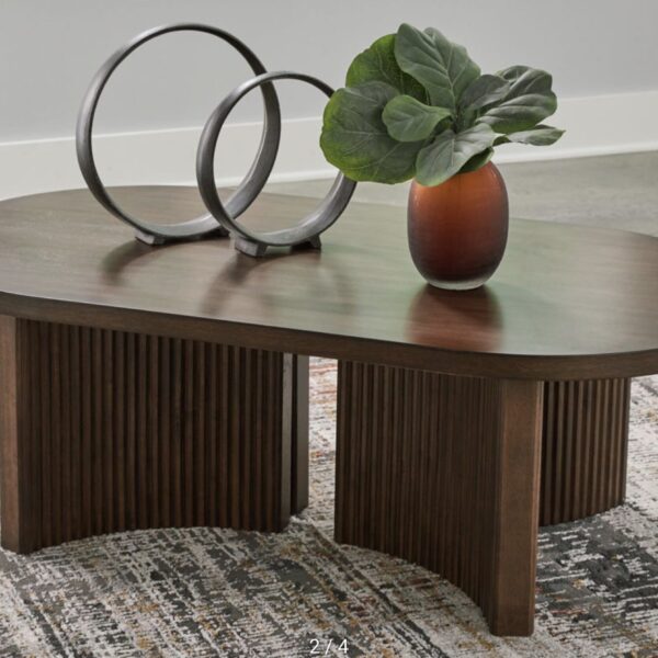 Korestone - Oval Cocktail Table - Dark Brown